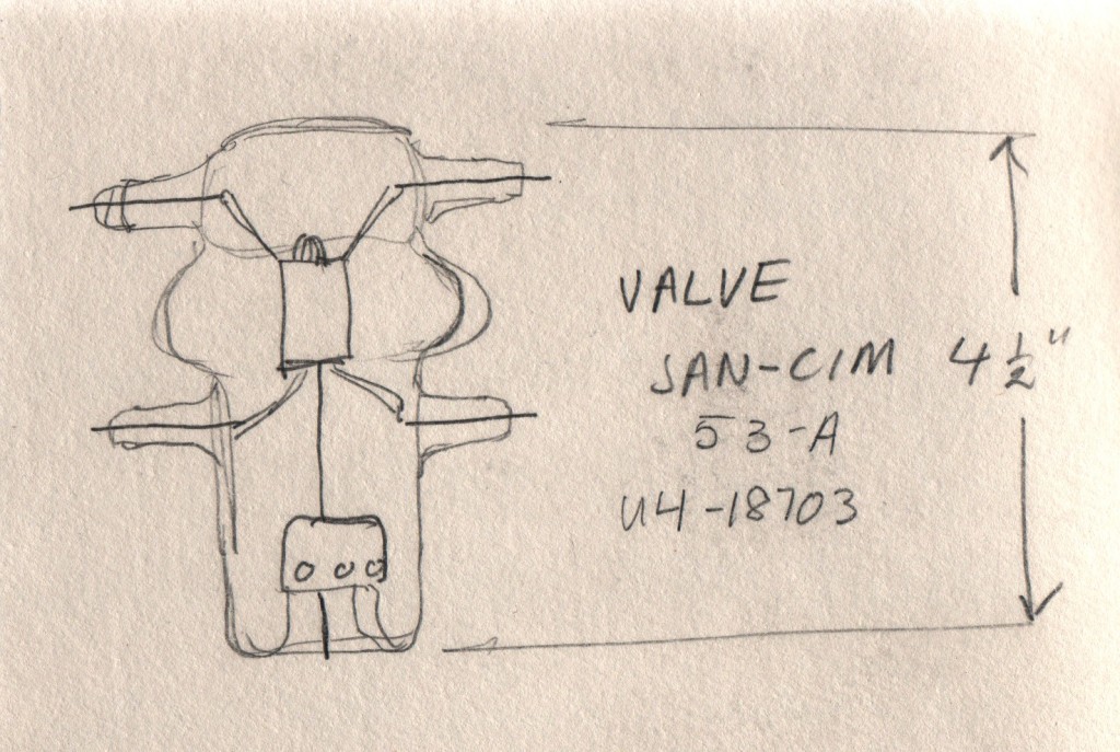 Valve, or vacuum tube, which predominated in electronics for the first two thirds of the Twentieth Century. Vacuum tubes came mostly in cylindrical form, but the industry produced some convoluted shapes as well. Based on what I can find on the Web, this is a 53A, a triode for operating up to 300 Megaherz. This vacuum tube was on display at Bangalore's Visvesvaraya Industrial and Technological Museum.